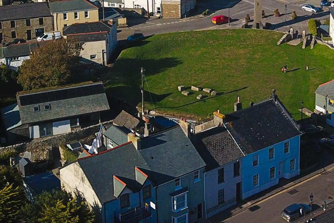 Aerial view of the Plain-an-Gwarry green in St Just with Tredenwith House's terrace facing it